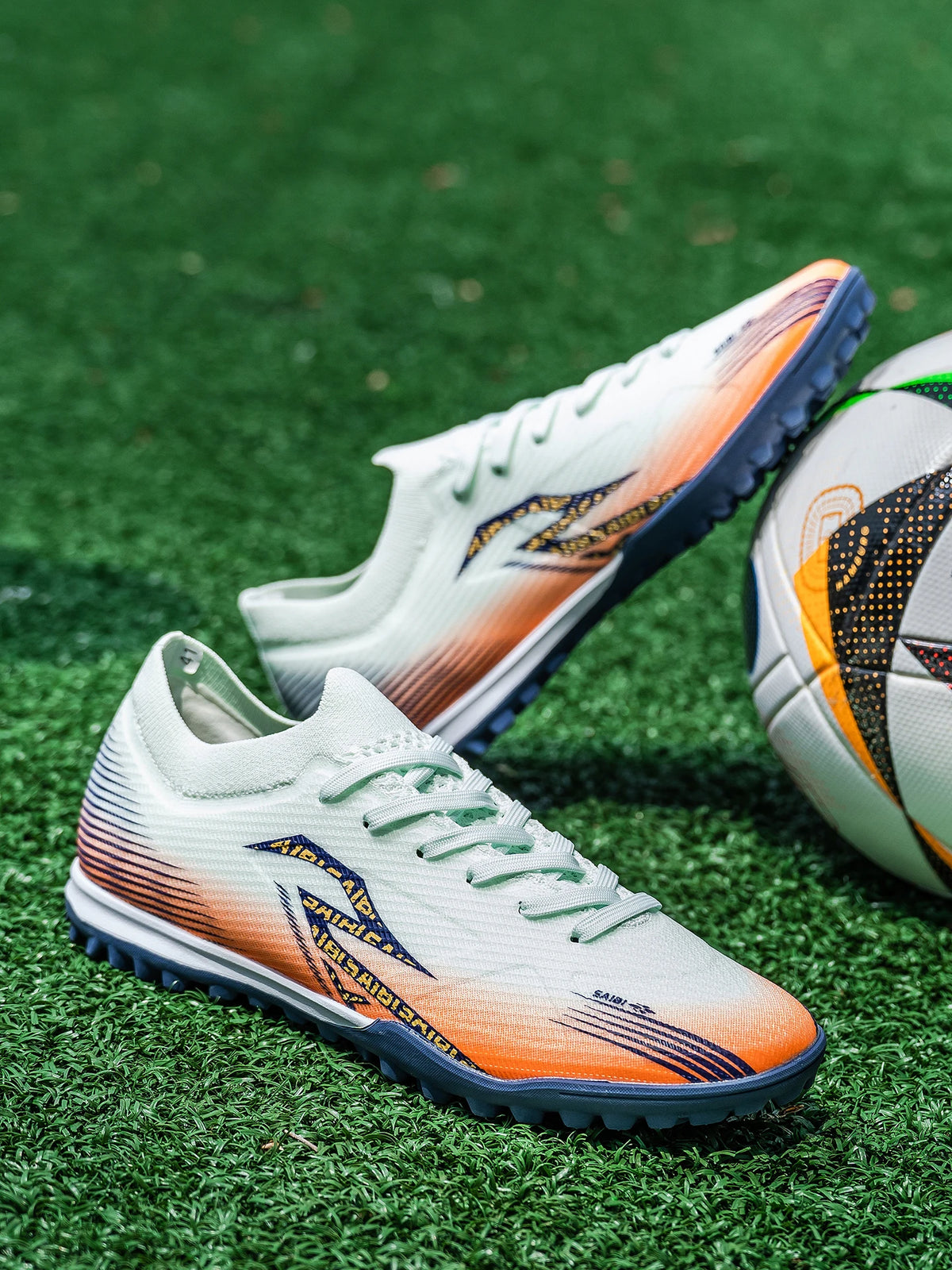 Chaussures de football pour hommes TF Turf, dessus en PU respirant, semelle extérieure en caoutchouc antidérapante, chaussures légères pour l'entraînement sur gazon artificiel.