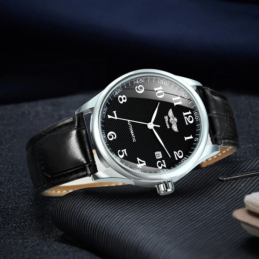 Relógio clássico para homem – Estilo retro com calendário e ponteiros azuis, movimento mecânico automático, marca de prestígio, caixa em aço e bracelete em pele