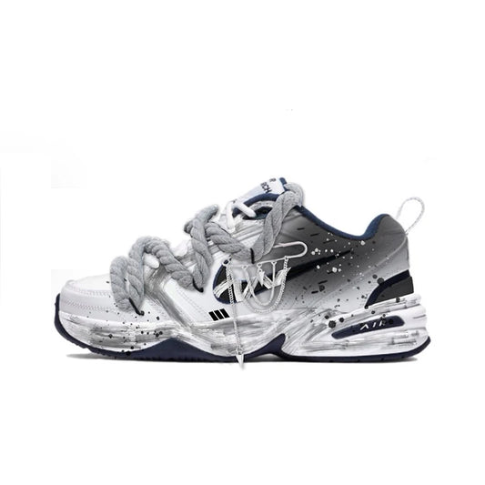 Spersonalizowane trampki Nike Air Monarch 4 – dekonstruowany wzór z efektem rozprysków atramentu, antypoślizgowe, odporne na zużycie, niskie buty do biegania unisex