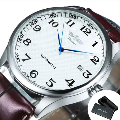 Relógio clássico para homem – Estilo retro com calendário e ponteiros azuis, movimento mecânico automático, marca de prestígio, caixa em aço e bracelete em pele